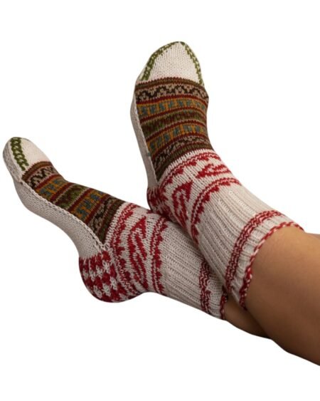 Part of Himachal’s G.I.-recognized woollen handicrafts 100% hand knitted using traditional Lahauli patterns Supports Himalayan women artisans Far warmer than regular machine-made socks Eco-friendly, natural, biodegradable wool